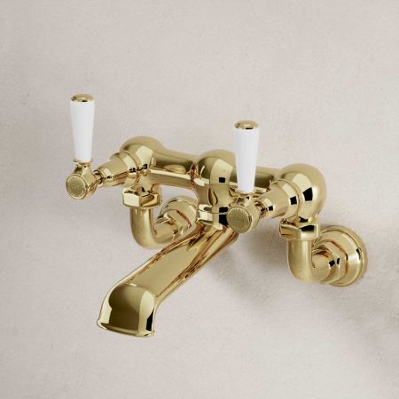 Linton Bath Filler Tap Wall Mounted White Lever Timeless Brass 3/4BSP