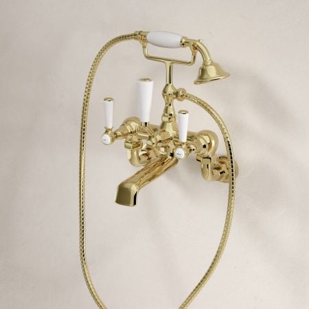 Linton Classic 2 Hole Bath Shower Mixer with White Levers in Timeless Brass