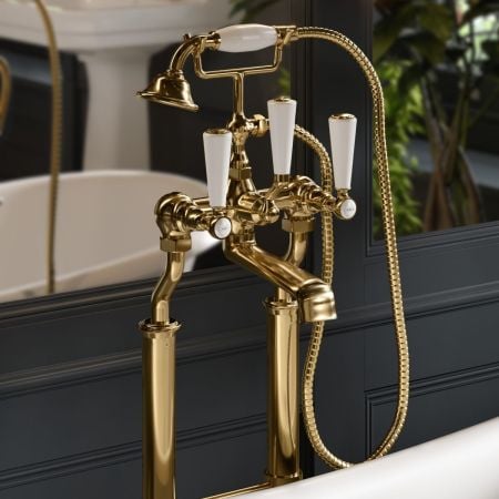 Linton Classic Floor Mounted 2 Hole Bath Shower Mixer with 620mm Standpipes - White Lever - Living Brass