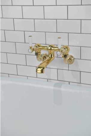 Linton Bath Filler Tap Wall Mounted White Lever Gold 3/4BSP