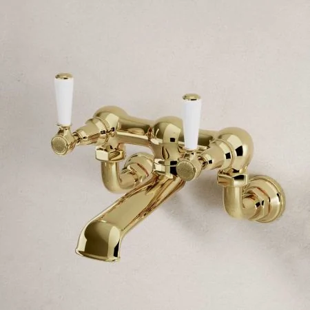 Linton Bath Filler Tap Wall Mounted White Lever Timeless Brass 3/4BSP